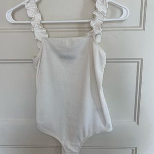 White body suit - never worn!